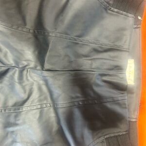 Women’s medium faux leather pants except condition 
Straight leg
Elastic waist